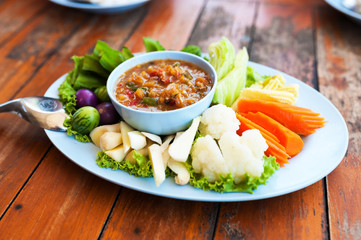Chili in bowl with vegetable
