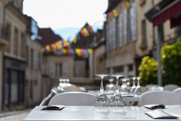 Wine glasses on the table summer terrace of restaurant
