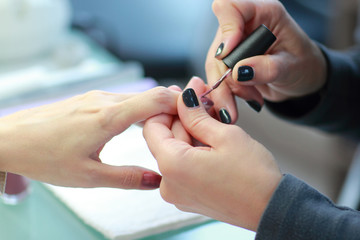 Manicure. Processing of nails by a nail file