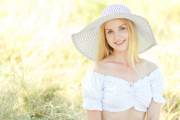 Outdoor summer colorful portrait of pretty young beautiful woman having fun 