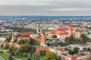 Fototapeta na wymiar Royal castle on the Wawel hill and Krakow old town - aerial view