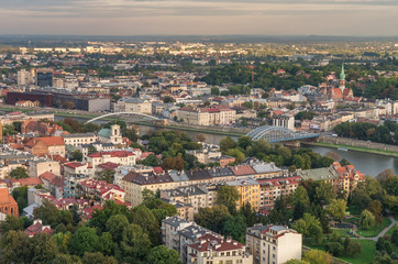 Fototapeta na wymiar Districts of Kazimierz and Podgorze, connected with bridges over Vistula river, Krakow Poland, aerial view