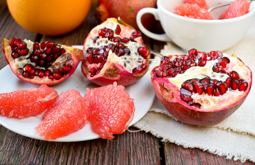 Juicy fresh ripe pomegranate and grapefruit in bowl