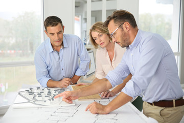 Team of architects meeting in office