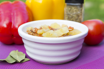 Meat ragout with veggies in bowl