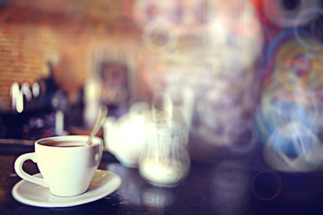 cup of tea at a cafe blurred background