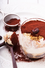 Tiramisu, traditional Italian dessert in a glass