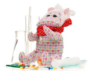 Naklejka premium Toy with pills