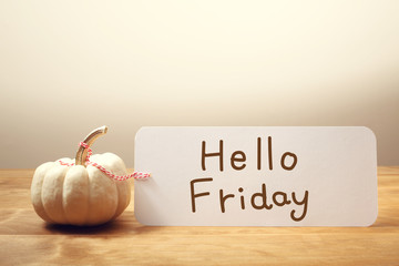 Hello Friday message with small pumpkin