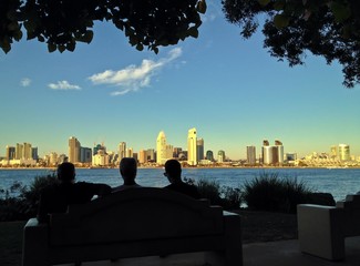 People Viewing Downtown Skyline from a Bench, San Diego, California