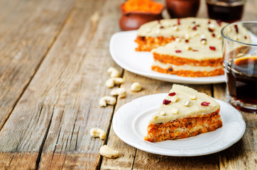 raw vegan carrot cake with cashew cream and dried cranberries