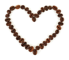 Heart shaped coffee beans isolated on white