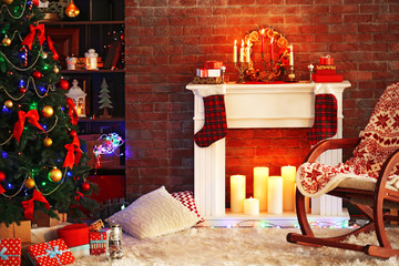 Beautiful Christmas interior with fireplace and fir tree