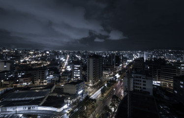 Fototapeta na wymiar Cool vibrant photo Quito at night showing parts of the city with