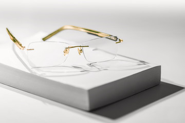 reading glasses on book