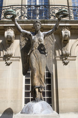 Belle Epoque statute in the garden of the Hotel Carnavalet which houses the msueum of the history...