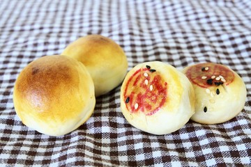 Chinese Mooncakes on plate mat