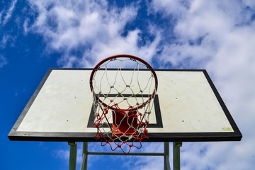 Basketball board with blue sky