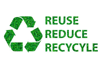 Recycle logo on grass