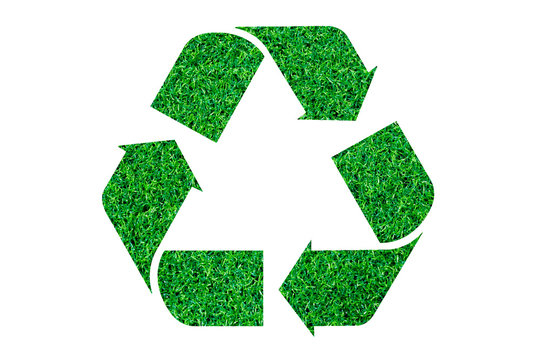 Recycle logo on grass