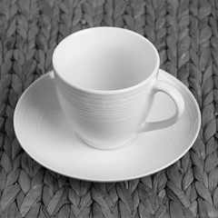 white ceramic earthenware cup