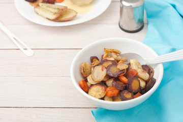 roasted root vegetables: carrots, parsnips, sliced and roasted