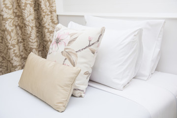 Fototapeta na wymiar comfortable soft pillows on the bed