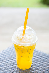 Passion fruit juice in plastic cups