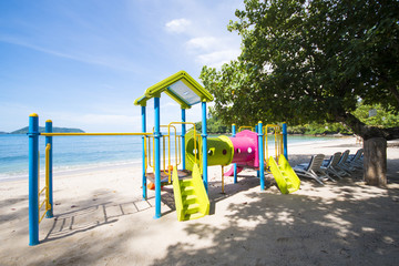 Fototapeta na wymiar colorful playground on the beach