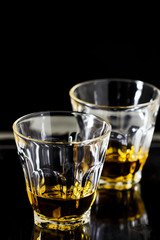Two glasses of whiskey