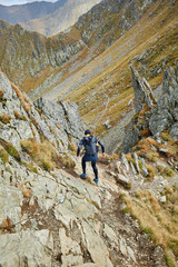 Naklejka premium Caucasian hiker with backpack