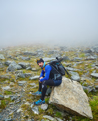 Obraz premium Caucasian hiker with backpack