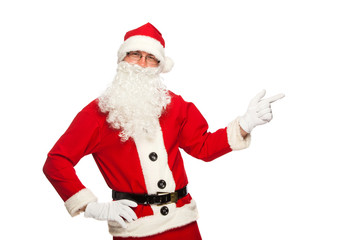 Santa Claus pointing sign with smile, isolated on white