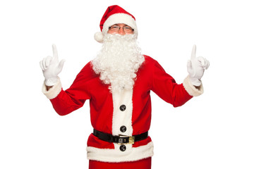 Santa Claus pointing sign with smile, isolated on white