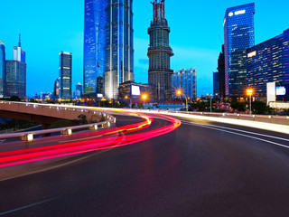 Empty road surface with shanghai lujiazui city buildings