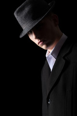 Portrait of handsome man in low key lighting