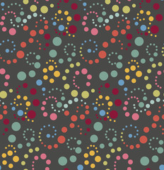 Seamless vector pattern or texture with colorful polka dots on
