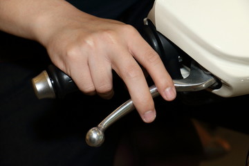 background of hand on motorcycle brake