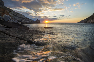 Fototapeta premium Spectacular sunrise on the rocky coast