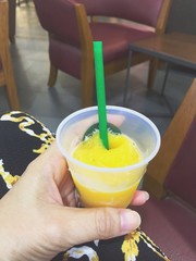 passion fruit juice in mini plastic glass