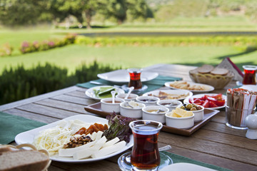 Rich and delicious Turkish breakfast on wood table
