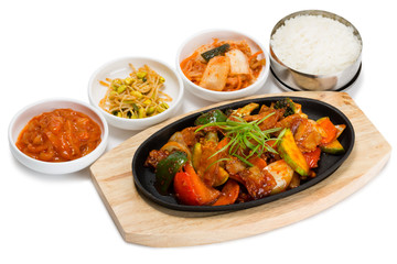 Roasted meat with vegetables in a skillet