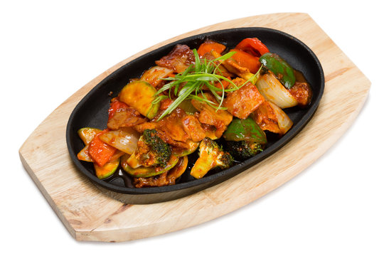 Roasted meat with vegetables in a skillet
