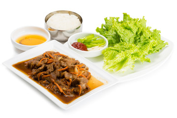 Stir-fried pork with carrots, onions and rice