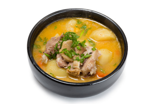 Soup pork shank with potatoes and spices