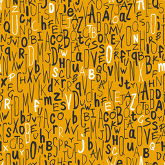 Seamless letters pattern. On yellow paper texture. Different han