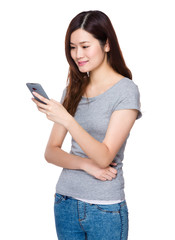 Naklejka premium Young Woman use of the mobile phone