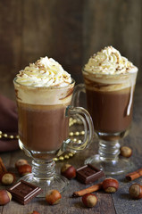 Hot chocolate with cinnamon and huzelnuts.