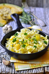 Farfalle with pumpkin,garlic and thyme.