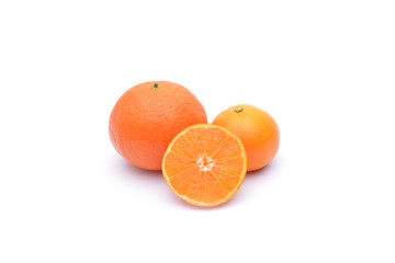 Whole orange fruit and his segments or cantles isolated on white background